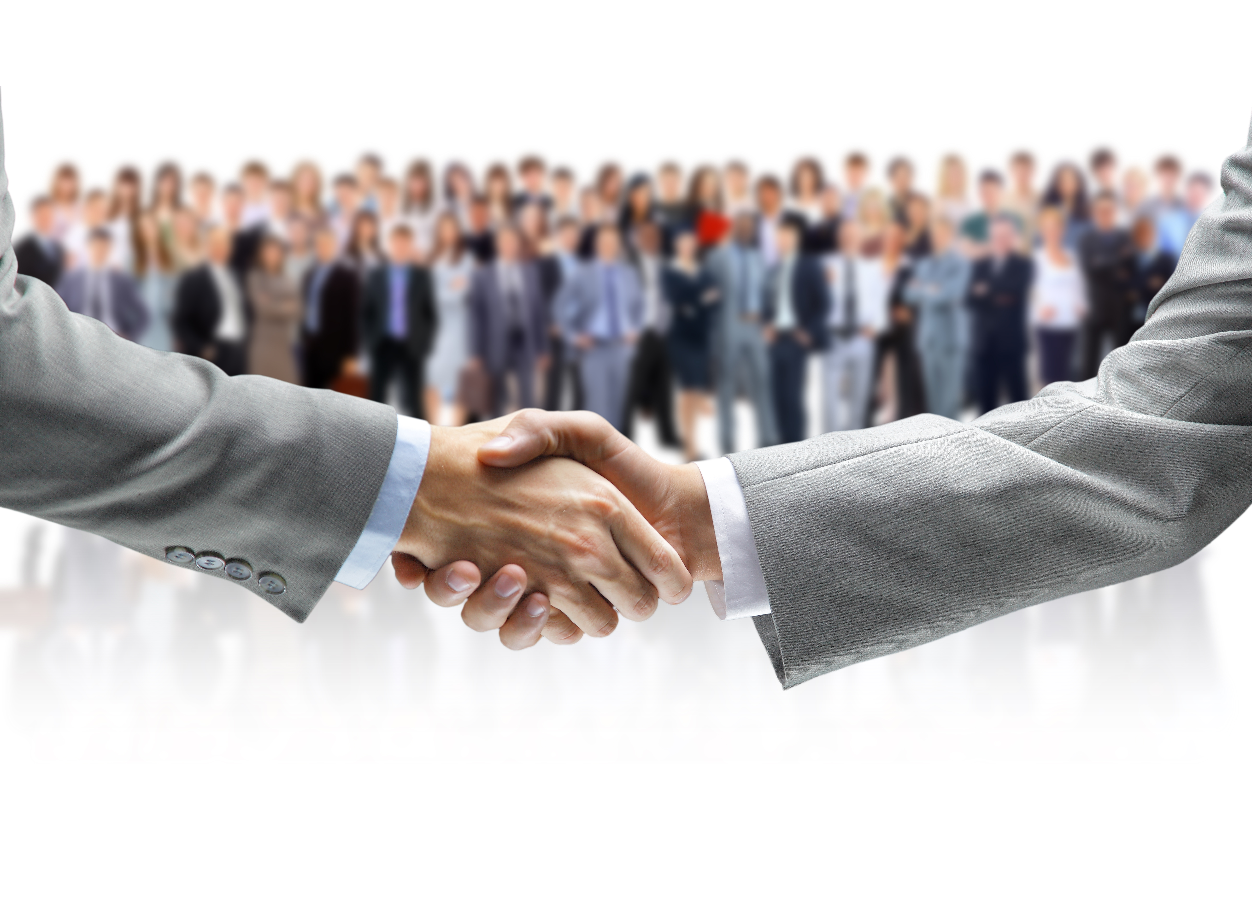 Professionals shaking hands at a Partners in Network meeting